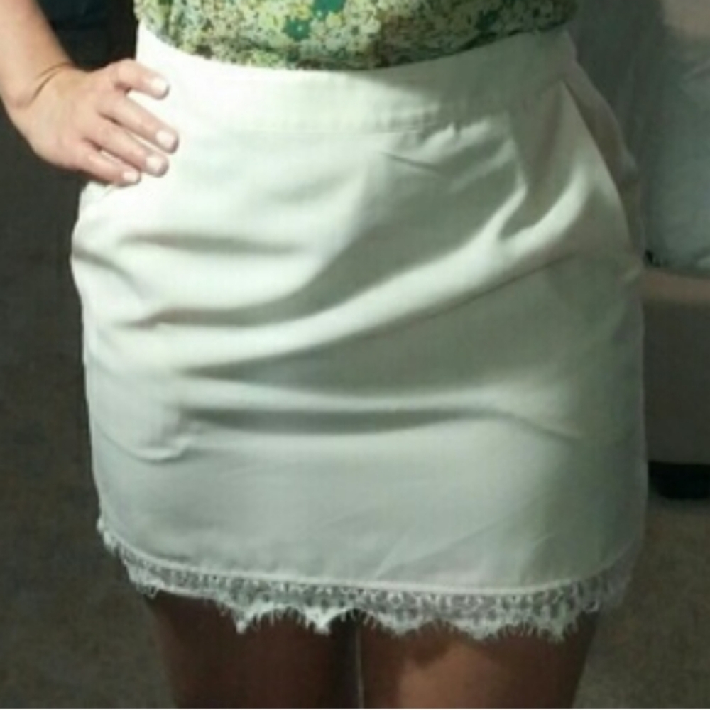 Cream lace trim mini skirt